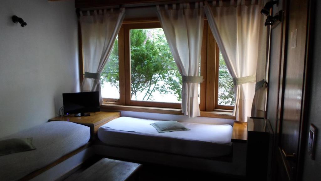 Apart Hotel Robles Del Sur Сан-Мартин-де-лос-Андес Номер фото